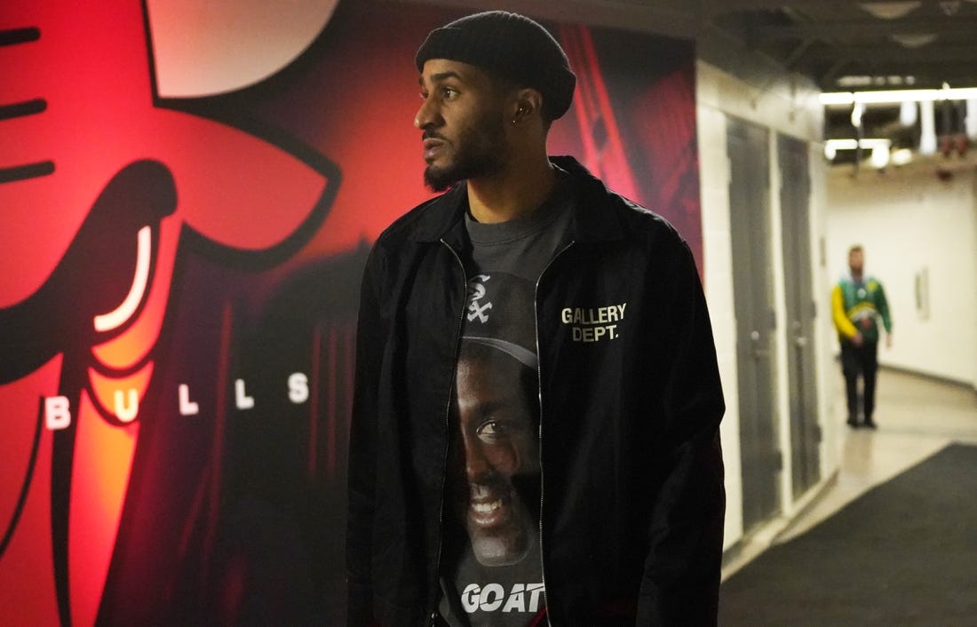 Feb 4, 2023; Chicago, Illinois, USA; Portland Trail Blazers guard Gary Payton II (00) enters the building before the game against the Chicago Bulls at United Center. Mandatory Credit: David Banks-USA TODAY Sports