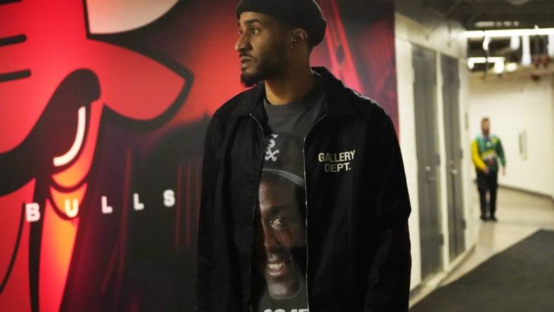 Feb 4, 2023; Chicago, Illinois, USA; Portland Trail Blazers guard Gary Payton II (00) enters the building before the game against the Chicago Bulls at United Center. Mandatory Credit: David Banks-USA TODAY Sports