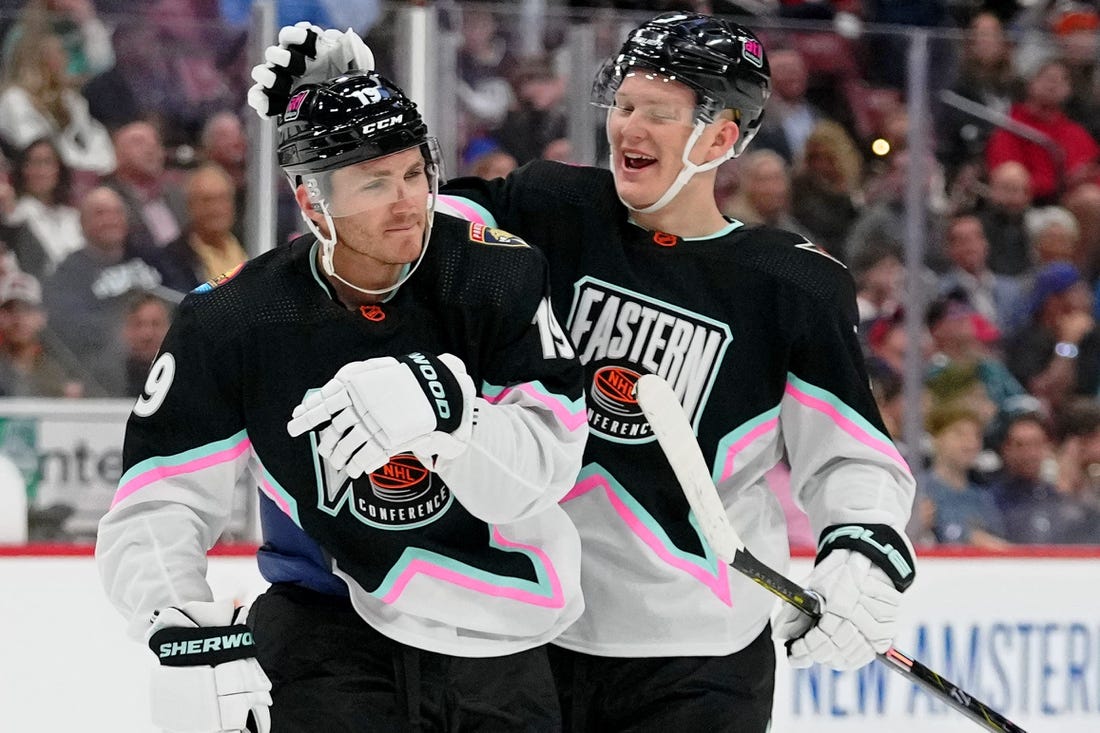 Feb 4, 2023; Sunrise, Florida, USA; Atlantic Division forward Brady Tkachuk (71) of the Ottawa Senators congratulates Atlantic Division forward Matthew Tkachuk (19) of the Florida Panthers during the second period of a semifinal game during the 2023 NHL All-Star Game at FLA Live Arena. Mandatory Credit: Jasen Vinlove-USA TODAY Sports