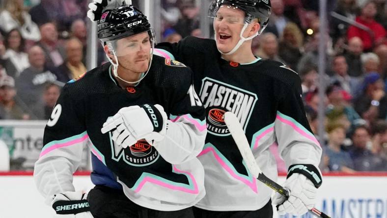 Feb 4, 2023; Sunrise, Florida, USA; Atlantic Division forward Brady Tkachuk (71) of the Ottawa Senators congratulates Atlantic Division forward Matthew Tkachuk (19) of the Florida Panthers during the second period of a semifinal game during the 2023 NHL All-Star Game at FLA Live Arena. Mandatory Credit: Jasen Vinlove-USA TODAY Sports