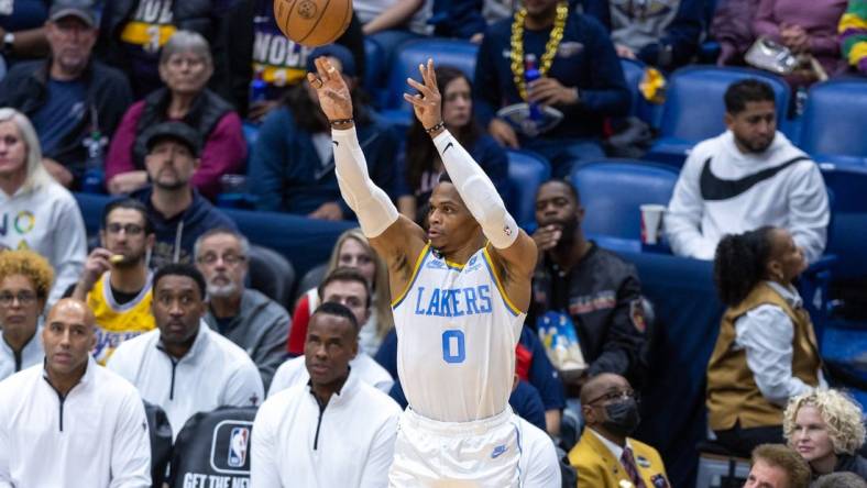 Feb 4, 2023; New Orleans, Louisiana, USA;  Los Angeles Lakers guard Russell Westbrook (0) shoots a jump shot against the New Orleans Pelicans during the first half at Smoothie King Center. Mandatory Credit: Stephen Lew-USA TODAY Sports