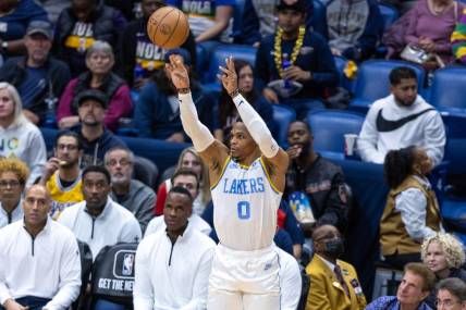 Feb 4, 2023; New Orleans, Louisiana, USA;  Los Angeles Lakers guard Russell Westbrook (0) shoots a jump shot against the New Orleans Pelicans during the first half at Smoothie King Center. Mandatory Credit: Stephen Lew-USA TODAY Sports