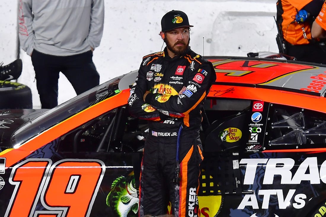 Feb 4, 2023; Los Angeles, California, USA; NASCAR Cup Series driver Martin Truex Jr. (19) during qualifying at Los Angeles Memorial Coliseum. Mandatory Credit: Gary A. Vasquez-USA TODAY Sports