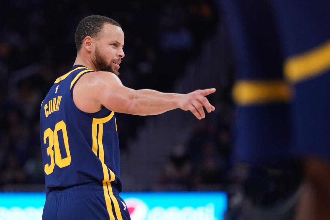 Feb 4, 2023; San Francisco, California, USA; Golden State Warriors guard Stephen Curry (30) directs teammates before a play against the Dallas Mavericks in the third quarter at the Chase Center. Mandatory Credit: Cary Edmondson-USA TODAY Sports