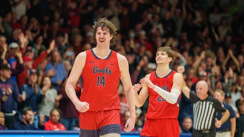 Feb 4, 2023; Moraga, California, USA; St. Mary's Gaels forward Kyle Bowen (14) and St. Mary's Gaels guard Aidan Mahaney (20) celebrate after the game against the Gonzaga Bulldogs at University Credit Union Pavilion. Mandatory Credit: Neville E. Guard-USA TODAY Sports