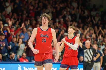 Feb 4, 2023; Moraga, California, USA; St. Mary's Gaels forward Kyle Bowen (14) and St. Mary's Gaels guard Aidan Mahaney (20) celebrate after the game against the Gonzaga Bulldogs at University Credit Union Pavilion. Mandatory Credit: Neville E. Guard-USA TODAY Sports