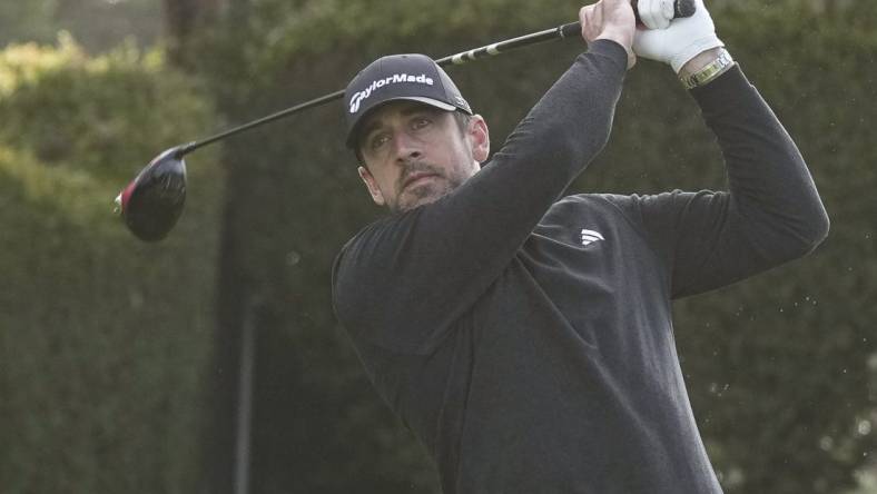 Feb 5, 2023; Pebble Beach, California, USA; Aaron Rodgers hits his tee shot on the fifteenth hole during the third round of the AT&T Pebble Beach Pro-Am golf tournament at Pebble Beach Golf Links. Mandatory Credit: Ray Acevedo-USA TODAY Sports