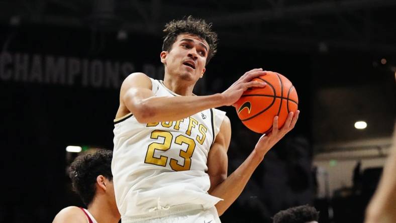 Feb 5, 2023; Boulder, Colorado, USA; Colorado Buffaloes forward Tristan da Silva (23) brings in a rebound in the second half against the Stanford Cardinal at the CU Events Center. Mandatory Credit: Ron Chenoy-USA TODAY Sports