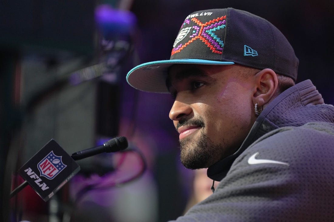 Feb 6, 2023; Phoenix, AZ, USA; Philadelphia Eagles quarterback Jalen Hurts (1) speaks with media during Super Bowl Opening Night at Footprint Center. Mandatory Credit: Joe Camporeale-USA TODAY Sports