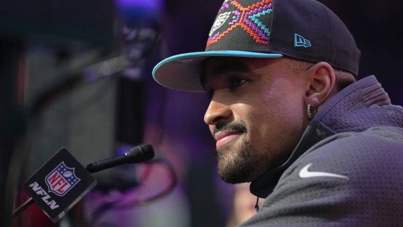 Feb 6, 2023; Phoenix, AZ, USA; Philadelphia Eagles quarterback Jalen Hurts (1) speaks with media during Super Bowl Opening Night at Footprint Center. Mandatory Credit: Joe Camporeale-USA TODAY Sports