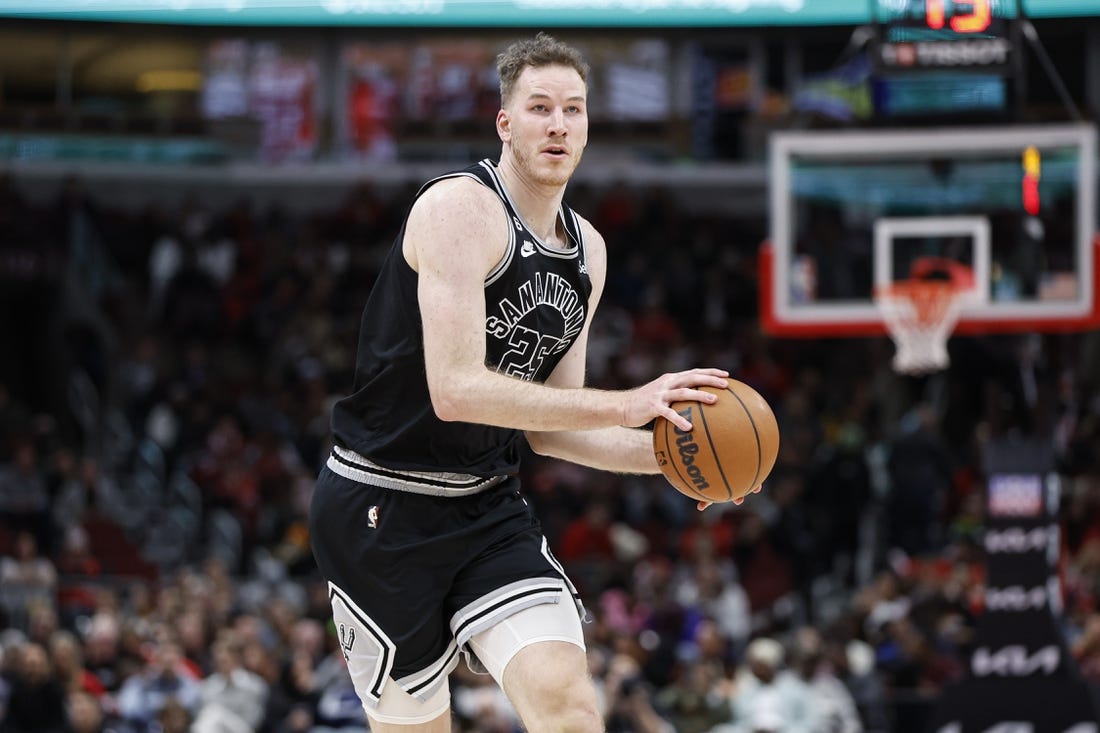 Feb 6, 2023; Chicago, Illinois, USA; San Antonio Spurs center Jakob Poeltl (25) brings the ball up court against the Chicago Bulls during the second half at United Center. Mandatory Credit: Kamil Krzaczynski-USA TODAY Sports