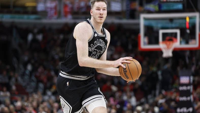 Feb 6, 2023; Chicago, Illinois, USA; San Antonio Spurs center Jakob Poeltl (25) brings the ball up court against the Chicago Bulls during the second half at United Center. Mandatory Credit: Kamil Krzaczynski-USA TODAY Sports
