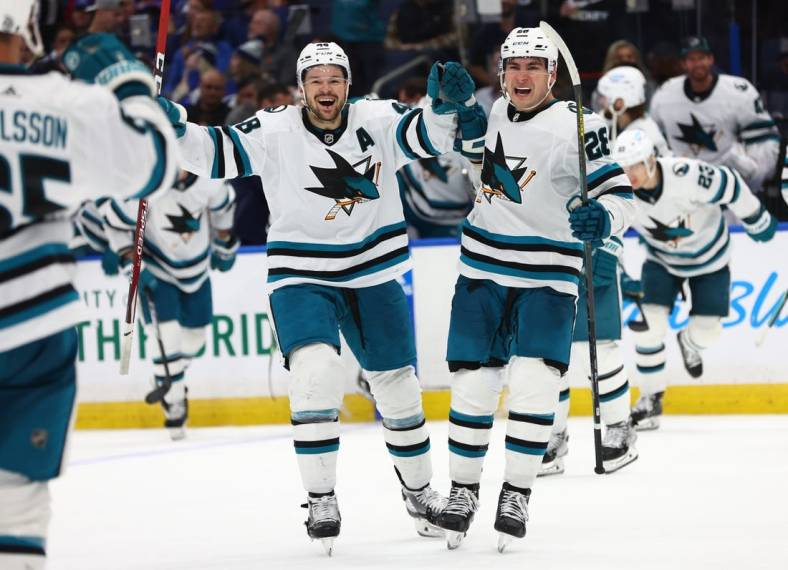 Feb 7, 2023; Tampa, Florida, USA; San Jose Sharks right wing Timo Meier (28) celebrates after he scored the game winning goal in overtime against the Tampa Bay Lightning at Amalie Arena. Mandatory Credit: Kim Klement-USA TODAY Sports