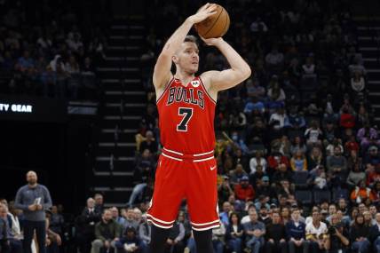 Feb 7, 2023; Memphis, Tennessee, USA; Chicago Bulls guard Goran Dragic (7) attempts a three-point shot during the second half against the Memphis Grizzlies at FedExForum. Mandatory Credit: Petre Thomas-USA TODAY Sports