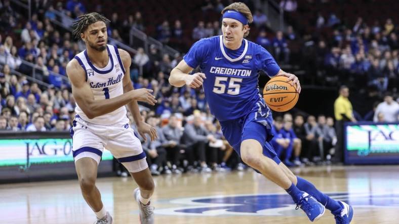 Feb 8, 2023; Newark, New Jersey, USA;  Creighton Bluejays guard Baylor Scheierman (55) looks to drive past Seton Hall Pirates forward Tray Jackson (1) in the first half at Prudential Center. Mandatory Credit: Wendell Cruz-USA TODAY Sports