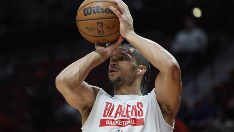 Feb 8, 2023; Portland, Oregon, USA; Portland Trail Blazers shooting guard Josh Hart (11) warms up prior to a game against the Golden State Warriors at Moda Center. Mandatory Credit: Soobum Im-USA TODAY Sports