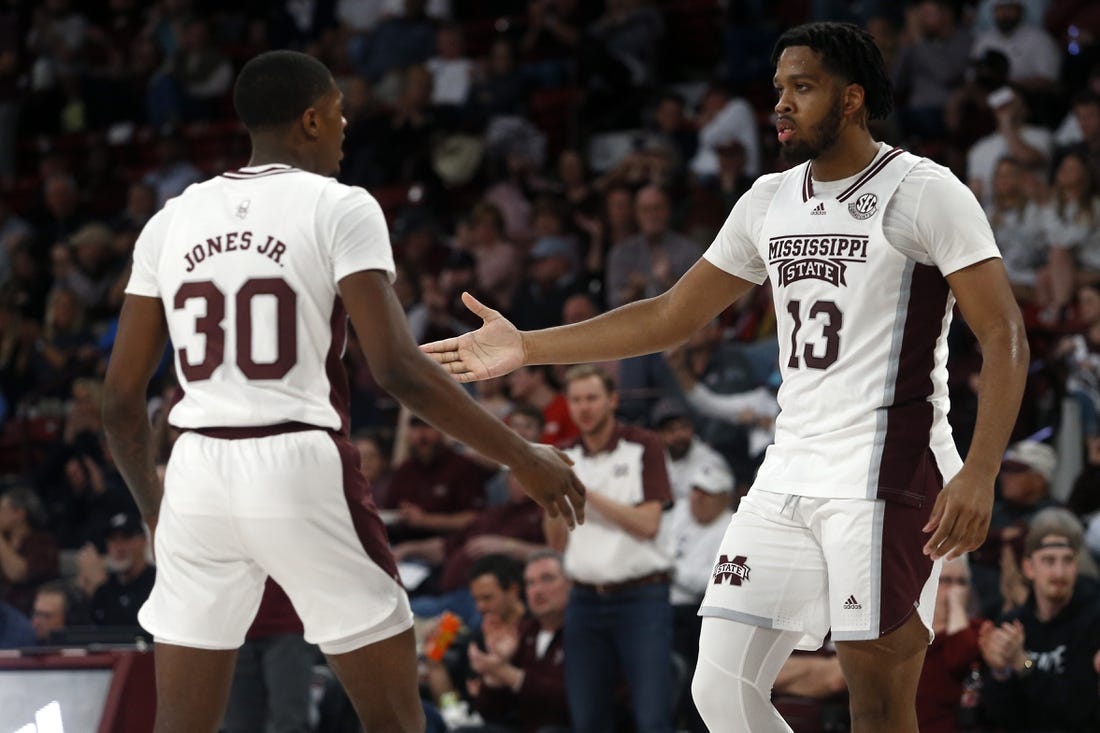 Feb 8, 2023; Starkville, Mississippi, USA; Mississippi State Bulldogs forward Will McNair Jr. (13) reacts with guard Shawn Jones Jr. (30) during the first half against the LSU Tigers at Humphrey Coliseum. Mandatory Credit: Petre Thomas-USA TODAY Sports