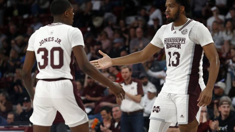 Feb 8, 2023; Starkville, Mississippi, USA; Mississippi State Bulldogs forward Will McNair Jr. (13) reacts with guard Shawn Jones Jr. (30) during the first half against the LSU Tigers at Humphrey Coliseum. Mandatory Credit: Petre Thomas-USA TODAY Sports