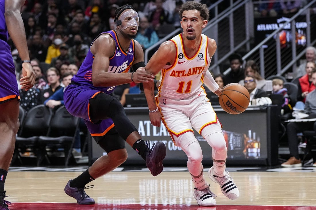 Is Trae Young playing tonight against the Phoenix Suns?