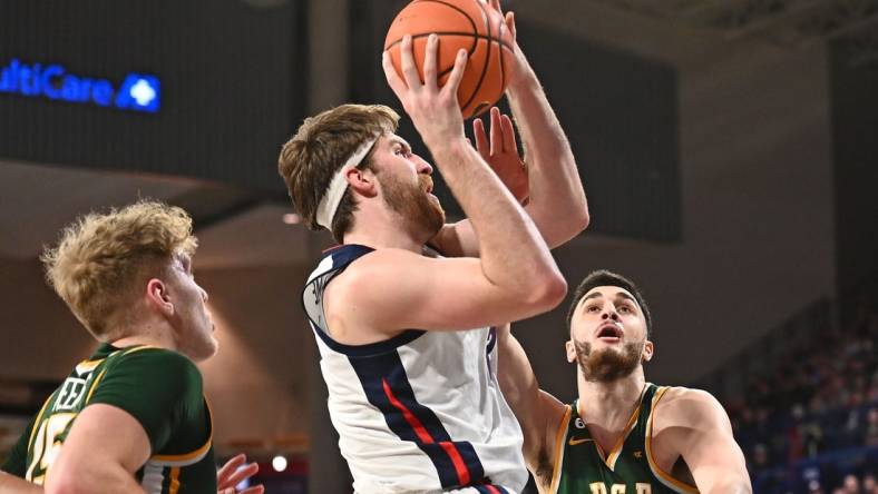 Feb 9, 2023; Spokane, Washington, USA; Gonzaga Bulldogs forward Drew Timme (2) is fouled on the shot by ]s5 in the first half at McCarthey Athletic Center. Mandatory Credit: James Snook-USA TODAY Sports