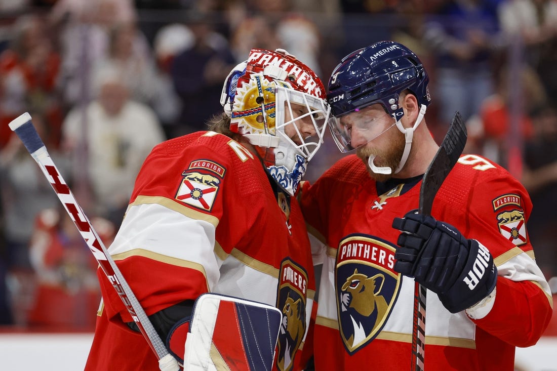 Feb 9, 2023; Sunrise, Florida, USA; Florida Panthers center Sam Bennett (9) celebrates with goaltender Sergei Bobrovsky (72) after winning the game against the San Jose Sharks at FLA Live Arena. Mandatory Credit: Sam Navarro-USA TODAY Sports