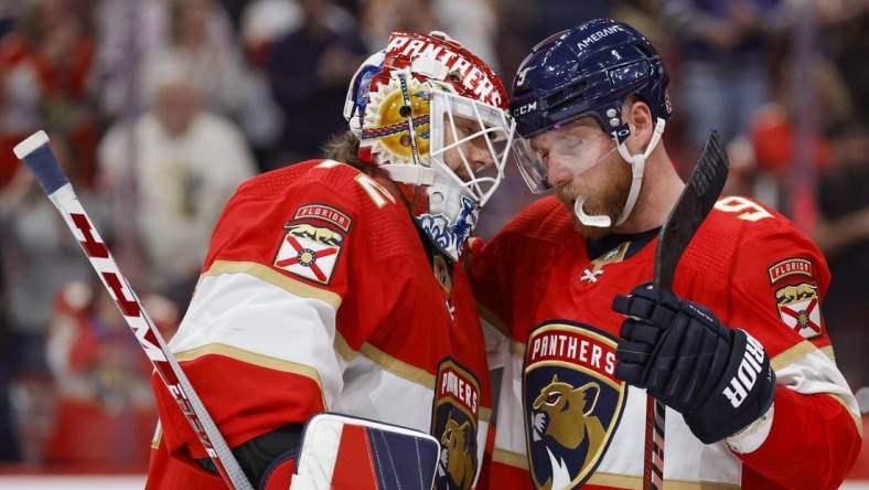 Feb 9, 2023; Sunrise, Florida, USA; Florida Panthers center Sam Bennett (9) celebrates with goaltender Sergei Bobrovsky (72) after winning the game against the San Jose Sharks at FLA Live Arena. Mandatory Credit: Sam Navarro-USA TODAY Sports