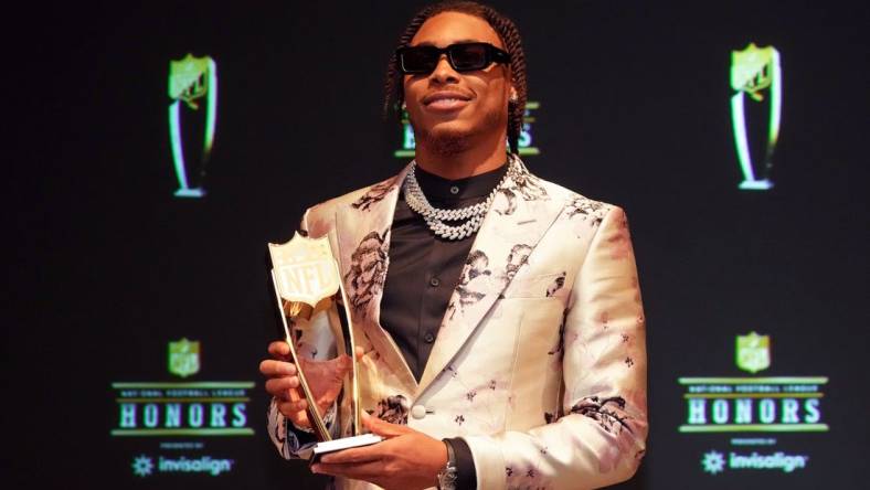 Feb 9, 2023; Phoenix, Arizona, US; Minnesota Vikings wide receiver Justin Jefferson poses for a photo after receiving the award for AP Offensive Player during the NFL Honors award show at Symphony Hall. Mandatory Credit: Kirby Lee-USA TODAY Sports