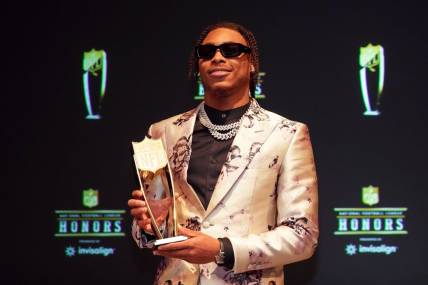 Feb 9, 2023; Phoenix, Arizona, US; Minnesota Vikings wide receiver Justin Jefferson poses for a photo after receiving the award for AP Offensive Player during the NFL Honors award show at Symphony Hall. Mandatory Credit: Kirby Lee-USA TODAY Sports