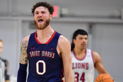 Feb 9, 2023; Los Angeles, California, USA; St. Mary's Gaels guard Logan Johnson (0) reacts against the Loyola Marymount Lions during the second half at Gersten Pavilion. Mandatory Credit: Gary A. Vasquez-USA TODAY Sports