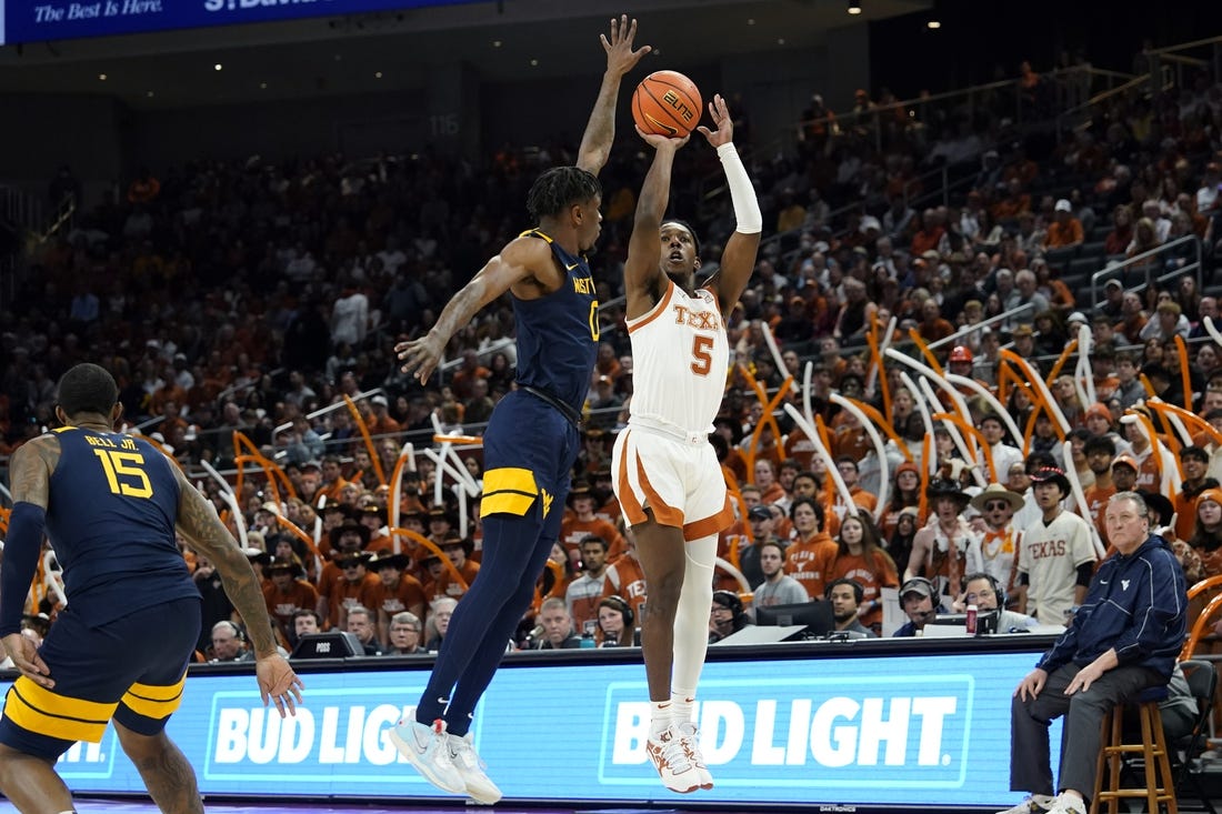 Balanced attack leads No. 5 Texas past West Virginia