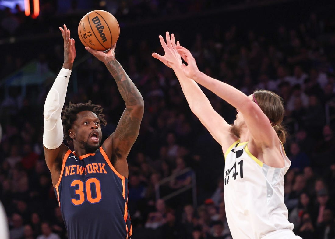 Feb 11, 2023; New York, New York, USA; New York Knicks forward Julius Randle (30) shoots the ball against Utah Jazz forward Kelly Olynyk (41) during the first half at Madison Square Garden. Mandatory Credit: Vincent Carchietta-USA TODAY Sports