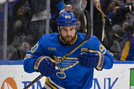 Feb 11, 2023; St. Louis, Missouri, USA;  St. Louis Blues center Ryan O'Reilly (90) reacts after scoring the game winning goal against the Arizona Coyotes during overtime at Enterprise Center. Mandatory Credit: Jeff Curry-USA TODAY Sports