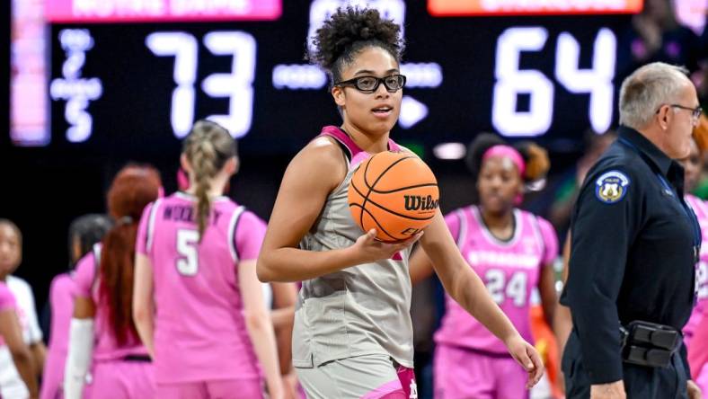 Feb 12, 2023; South Bend, Indiana, USA; Notre Dame Fighting Irish guard Olivia Miles (5) walks toward her bench after the game against the Syracuse Orange at the Purcell Pavilion. Mandatory Credit: Matt Cashore-USA TODAY Sports