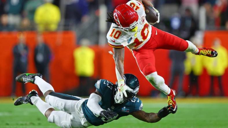 Feb 12, 2023; Glendale, Arizona, US; Philadelphia Eagles safety C.J. Gardner-Johnson (23) tackles Kansas City Chiefs running back Isiah Pacheco (10) during the fourth quarter of Super Bowl LVII at State Farm Stadium. Mandatory Credit: Mark J. Rebilas-USA TODAY Sports