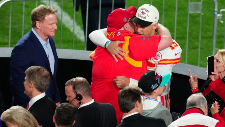 Kansas City Chiefs head coach Andy Reid hugs quarterback Patrick Mahomes (15) after defeating the Philadelphia Eagles as NFL commissioner Roger Goodell looks on in Super Bowl LVII at State Farm Stadium in Glendale on Feb. 12, 2023.

Nfl Super Bowl Lvii Kansas City Chiefs Vs Philadelphia Eagles