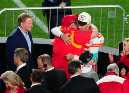 Kansas City Chiefs head coach Andy Reid hugs quarterback Patrick Mahomes (15) after defeating the Philadelphia Eagles as NFL commissioner Roger Goodell looks on in Super Bowl LVII at State Farm Stadium in Glendale on Feb. 12, 2023.

Nfl Super Bowl Lvii Kansas City Chiefs Vs Philadelphia Eagles