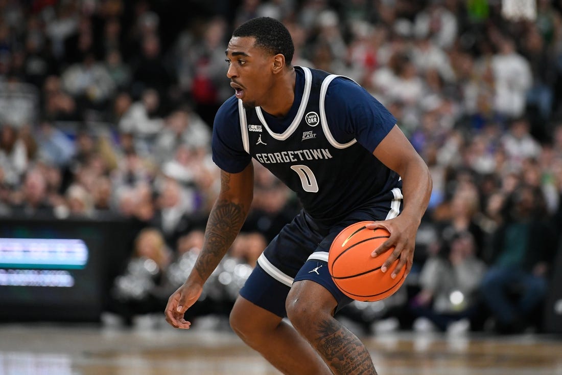 Feb 8, 2023; Providence, Rhode Island, USA; Georgetown Hoyas guard Brandon Murray (0) dribbles against the Providence Friars during the second half at Amica Mutual Pavilion. Mandatory Credit: Eric Canha-USA TODAY Sports
