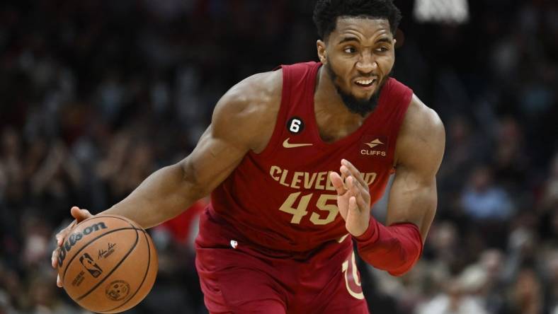 Feb 13, 2023; Cleveland, Ohio, USA; Cleveland Cavaliers guard Donovan Mitchell (45) drives to the basket during the second half against the San Antonio Spurs at Rocket Mortgage FieldHouse. Mandatory Credit: Ken Blaze-USA TODAY Sports