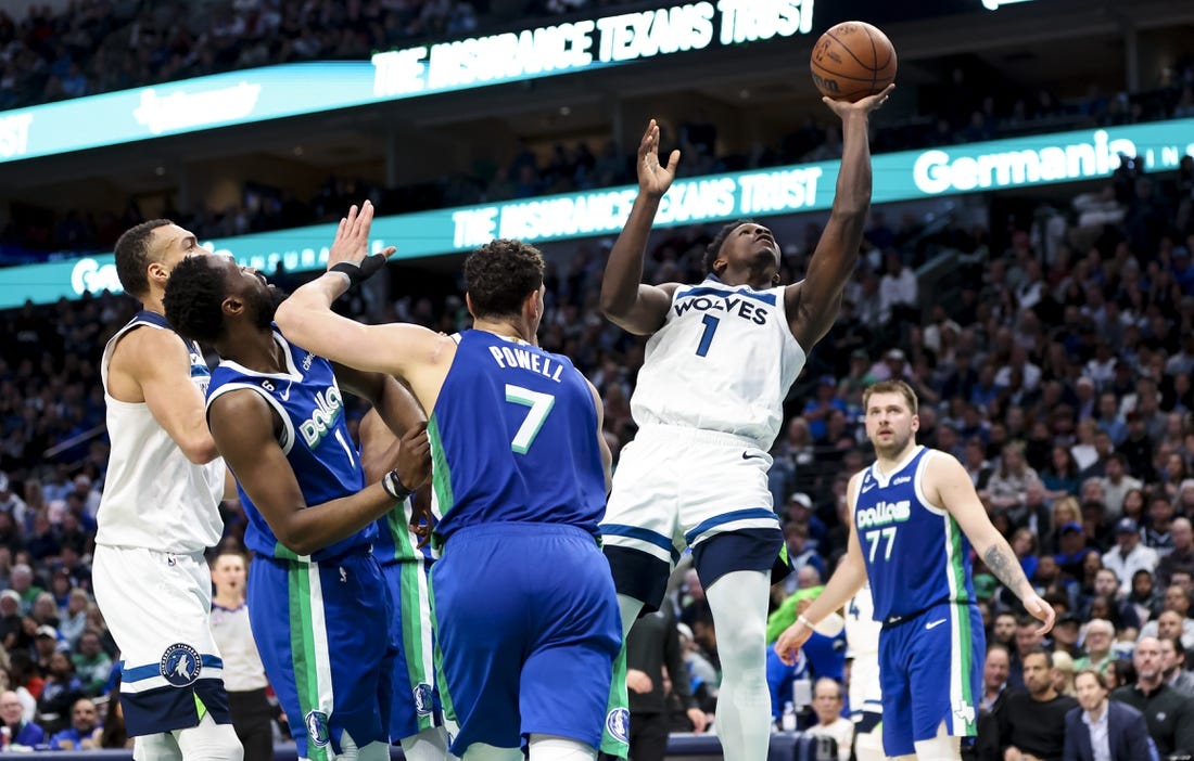 Feb 13, 2023; Dallas, Texas, USA;  Minnesota Timberwolves guard Anthony Edwards (1) shoots during the second quarter against the Dallas Mavericks at American Airlines Center. Mandatory Credit: Kevin Jairaj-USA TODAY Sports