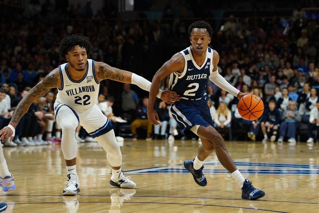 Feb 14, 2023; Villanova, Pennsylvania, USA; Butler Bulldogs guard Eric Hunter Jr. (2) dribbles the ball against Villanova Wildcats forward Cam Whitmore (22) during the first half  at William B. Finneran Pavilion. Mandatory Credit: Gregory Fisher-USA TODAY Sports