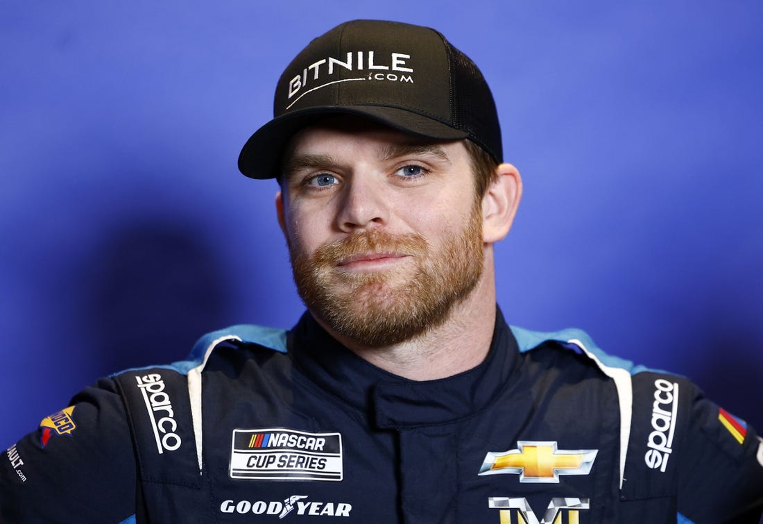 Feb 15, 2023; Daytona Beach, Florida, USA; NASCAR Cup Series driver Conor Daly (50) speaks to the media at Daytona International Speedway. Mandatory Credit: Mike Dinovo-USA TODAY Sports