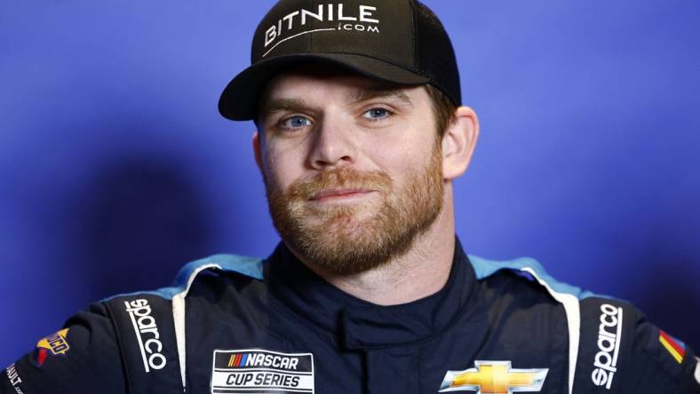 Feb 15, 2023; Daytona Beach, Florida, USA; NASCAR Cup Series driver Conor Daly (50) speaks to the media at Daytona International Speedway. Mandatory Credit: Mike Dinovo-USA TODAY Sports