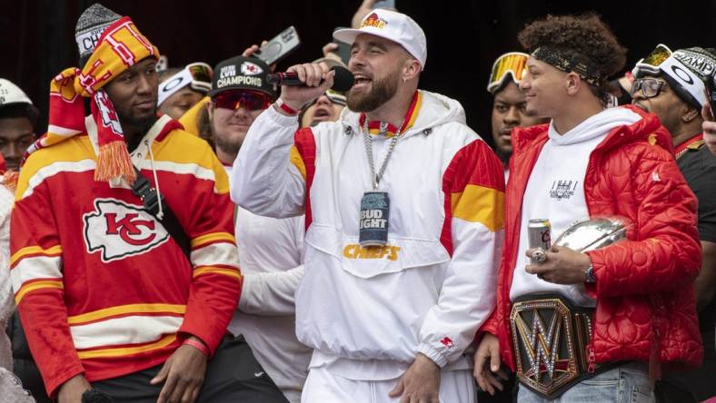 Feb 15, 2023; Kansas City, MO, USA;  Kansas City Chiefs  tight end Travis Kelce makes a speech at the Super Bowl LVII Champions Parade in downtown Kansas City, Mo. Mandatory Credit: Amy Kontras-USA TODAY Sports