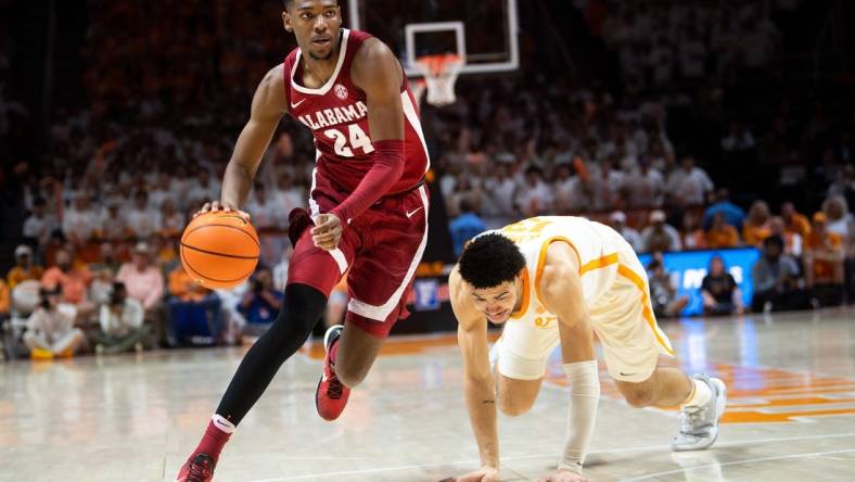 Alabama forward Brandon Miller (24) drives to the basket during a basketball game between the Tennessee Volunteers and the Alabama Crimson Tide held at Thompson-Boling Arena in Knoxville, Tenn., on Wednesday, Feb. 15, 2023.

Kns Vols Ut Martin Bp