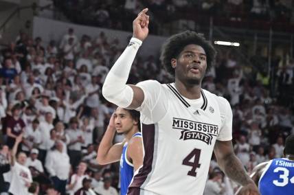 Feb 15, 2023; Starkville, Mississippi, USA; Mississippi State Bulldogs guard Cameron Matthews (4) reacts after dunking the ball against the Kentucky Wildcats during the second half at Humphrey Coliseum. Mandatory Credit: Matt Bush-USA TODAY Sports