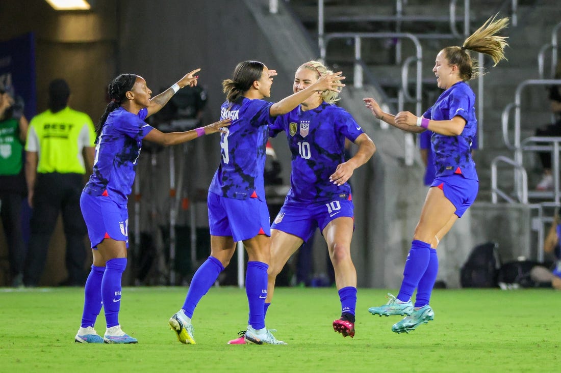 Feb 16, 2023; Orlando, Florida, USA; USA forward Mallory Swanson (9) celebrates with teammates after scoring a goal during the first half against Canada at Exploria Stadium. Mandatory Credit: Mike Watters-USA TODAY Sports