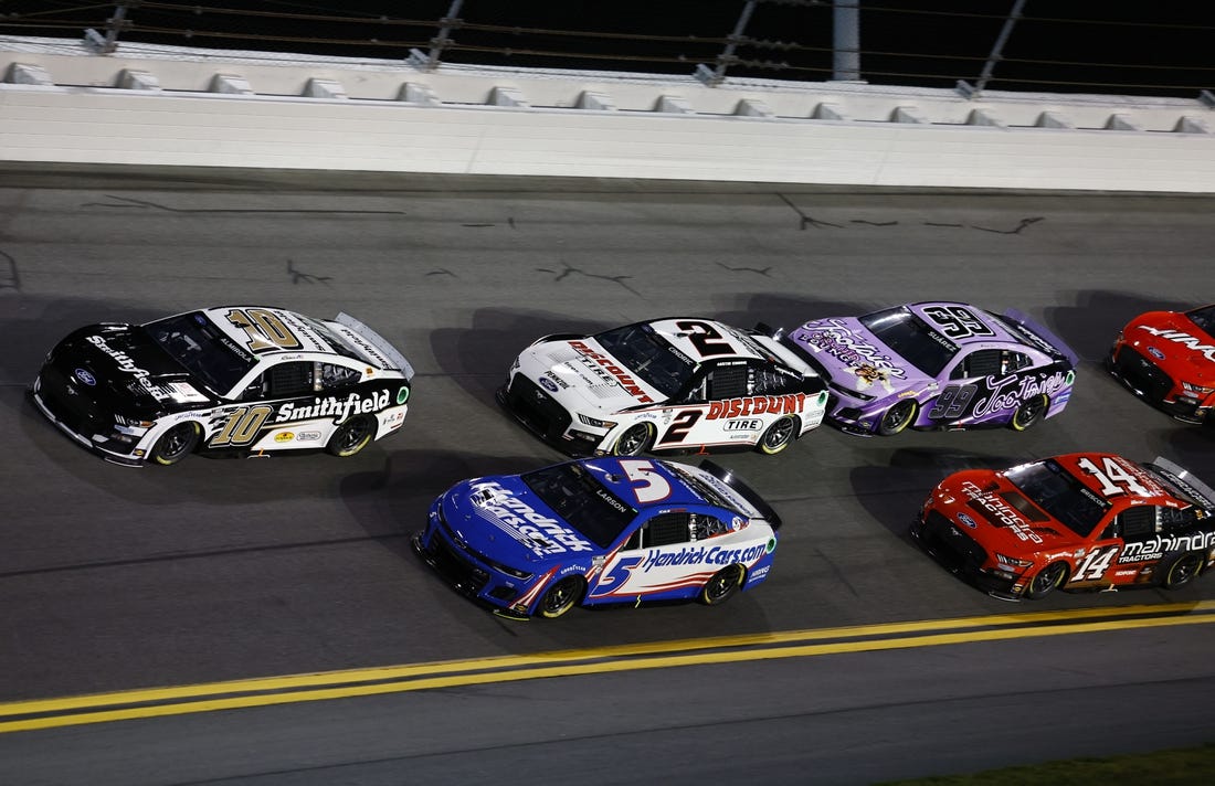 Feb 16, 2023; Daytona Beach, Florida, USA; NASCAR Cup Series driver Aric Almirola (10) leads the field during Duel 2 at Daytona International Speedway. Mandatory Credit: Mike Dinovo-USA TODAY Sports