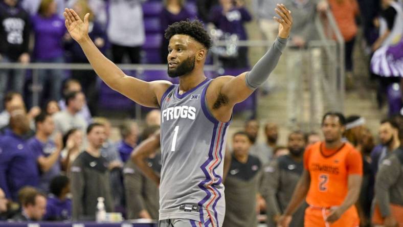 Feb 18, 2023; Fort Worth, Texas, USA; TCU Horned Frogs guard Mike Miles Jr. (1) celebrates the win over the Oklahoma State Cowboys at the Ed and Rae Schollmaier Arena. Mandatory Credit: Jerome Miron-USA TODAY Sports