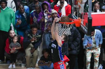 Feb 18, 2023; Salt Lake City, UT, USA; Philadelphia 76ers guard Mac McClung (9) dunks in the Dunk Contest during the 2023 All Star Saturday Night at Vivint Arena. Mandatory Credit: Kirby Lee-USA TODAY Sports