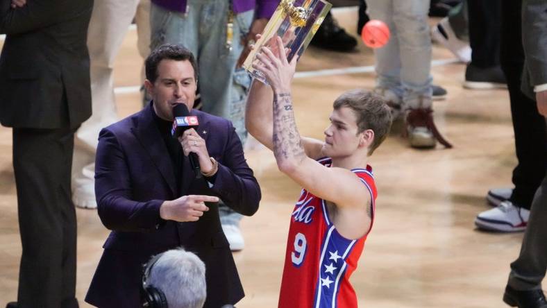 Feb 18, 2023; Salt Lake City, UT, USA; Philadelphia 76ers guard Mac McClung (9) reacts after winning the Dunk Contest during the 2023 All Star Saturday Night at Vivint Arena. Mandatory Credit: Kirby Lee-USA TODAY Sports